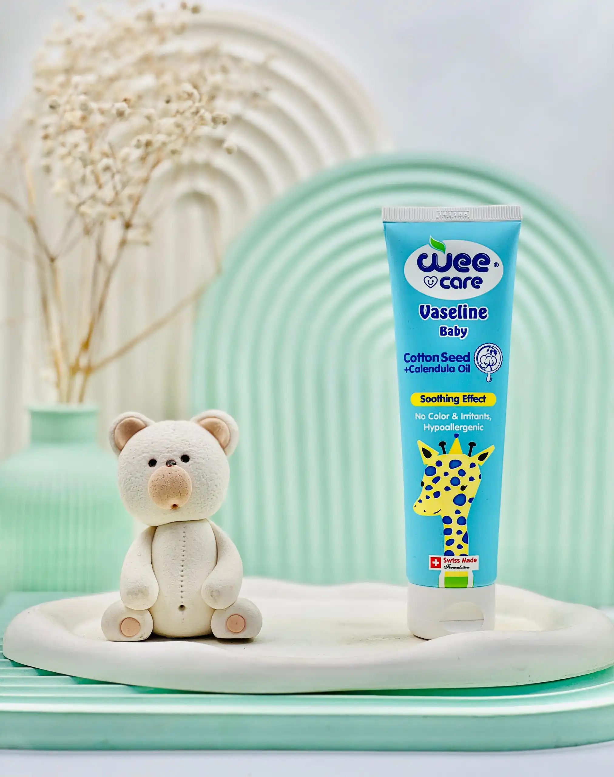 wee care vaselin baby cotton seed plus calendola oil daroosazam.com وازلین ژله ای کودک پنبه دانه و کالندولا وی کر